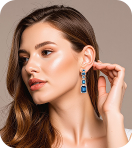 Modelo feminina usando brincos azuis retangulares, olhando de perfil com expressão suave.